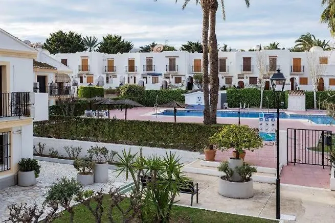 J T Beach Apartment Вера